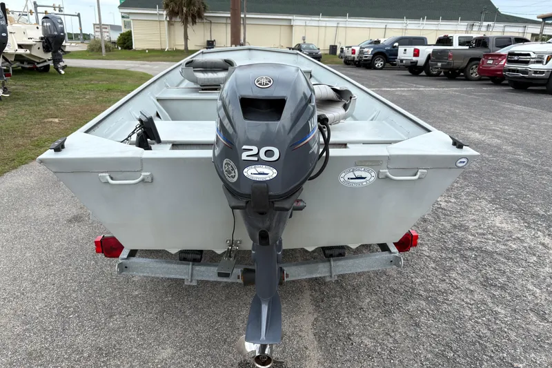 Slide: The Image of 2011 SeaArk 1448 MV boat with Yamaha 20HP motor on trailer. - 2