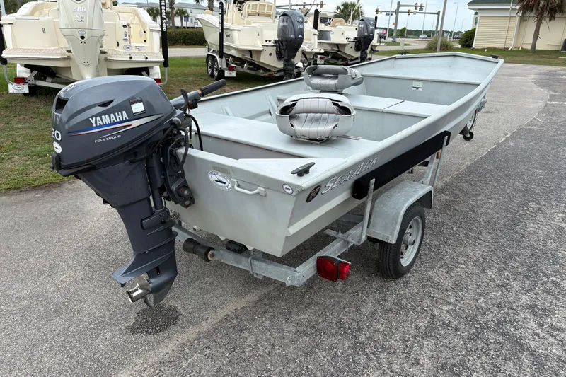 Slide: The Image of 2011 SeaArk 1448 MV boat with Yamaha outboard motor on trailer. - 3
