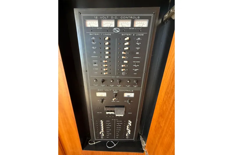 Slide: The Image of Electrical control panel on a 2001 Silverton 42 Convertible boat. - 46