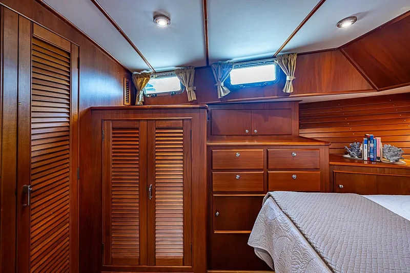 Slide: The Image of Luxurious wooden cabin interior of 2004 Grand Banks 49 Eastbay HX yacht. - 24