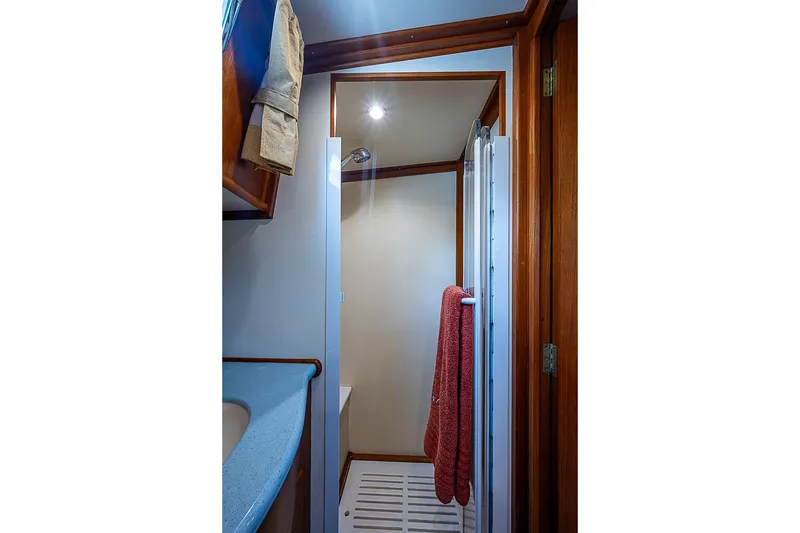 Slide: The Image of Shower area in 2004 Grand Banks 49 Eastbay HX yacht with wooden accents. - 29