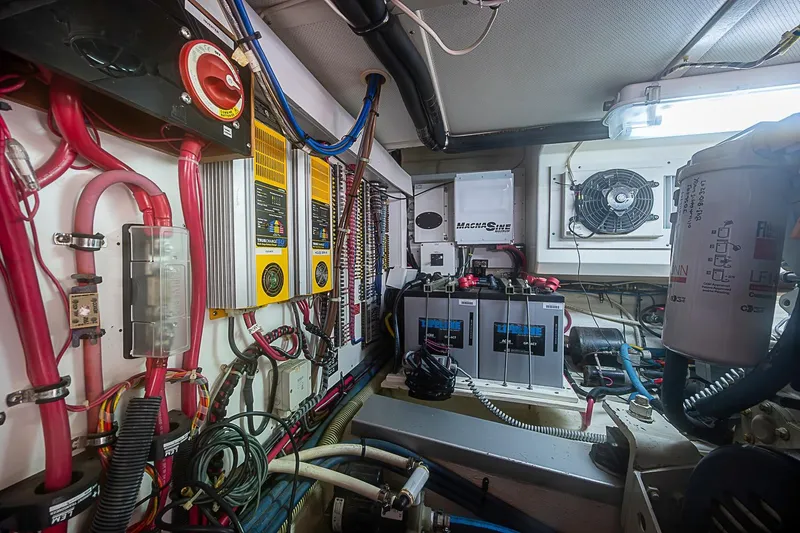 Slide: The Image of Electrical system of a 2004 Grand Banks 49 Eastbay HX yacht, featuring wiring and components. - 34