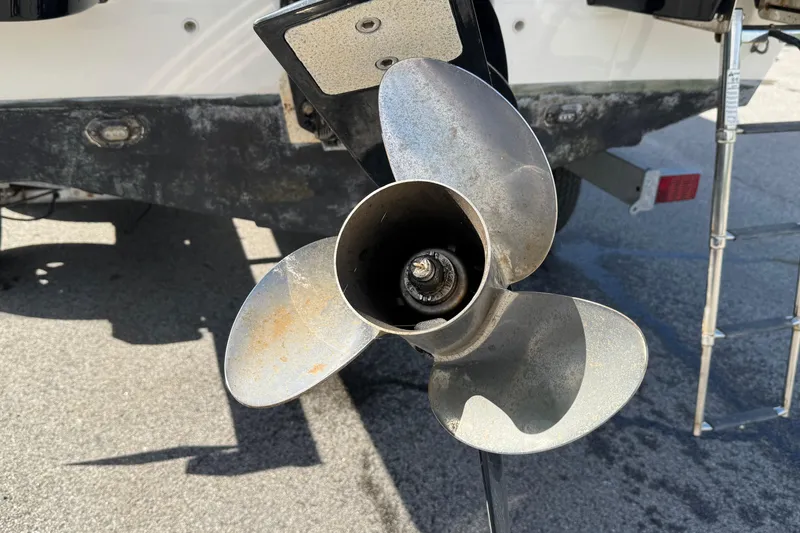 Slide: The Image of Propeller of a 2021 Trophy T22CX boat on a trailer. - 13