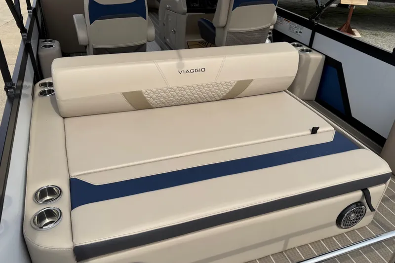 Slide: The Image of Luxurious seating on 2022 Viaggio Diamante S 26 boat with cup holders and speaker. - 14