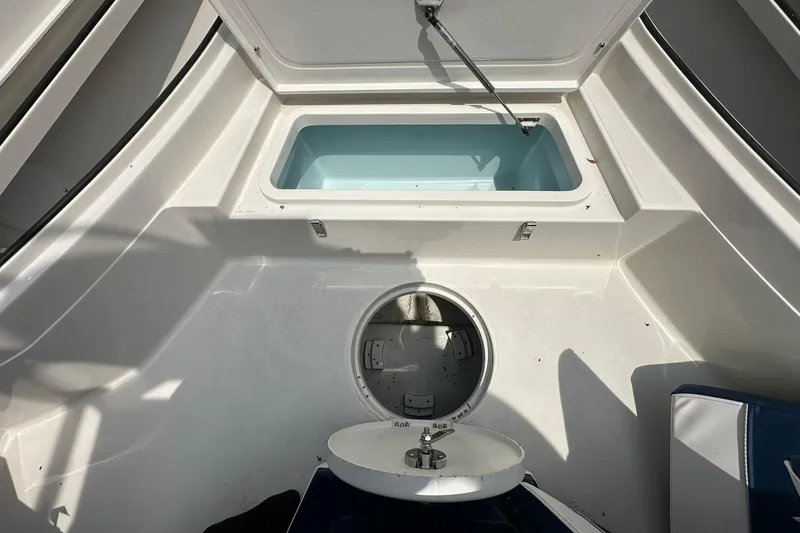 Slide: The Image of Interior view of 2026 Ranger 2660 Bay boat storage compartments. - 11