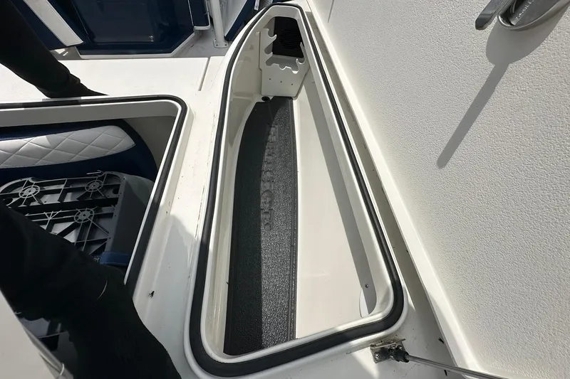 Slide: The Image of Interior view of 2026 Ranger 2660 Bay boat storage compartment. - 13