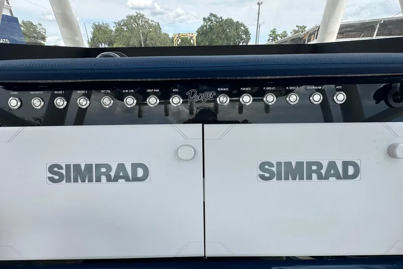 Slide: The Image of Control panel of 2026 Ranger 2660 Bay boat with Simrad electronics. - 25