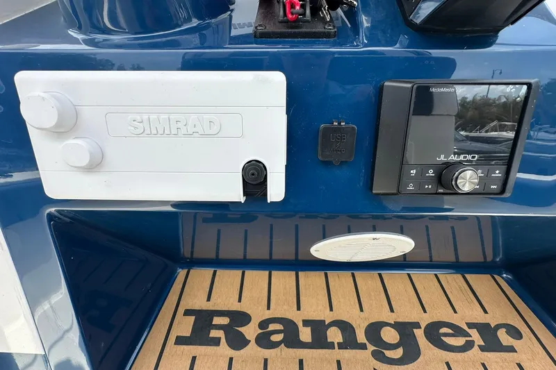 Slide: The Image of Control panel of 2026 Ranger 2660 Bay boat with Simrad and JL Audio systems. - 29
