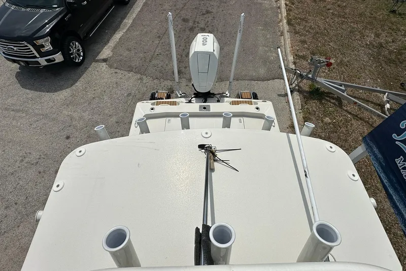 Slide: The Image of Overhead view of 2026 Ranger 2660 Bay boat with motor and rod holders. - 40