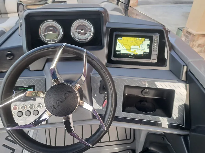 Slide: The Image of 2025 Avalon Catalina Quad Lounge Shift dashboard with GPS display. - 20