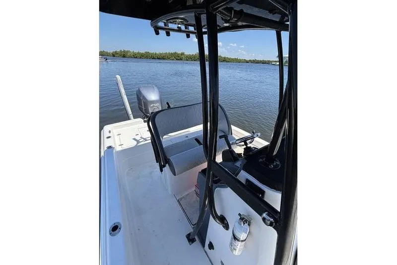 Slide: The Image of 2018 ShearWater 25 LTD boat interior with water view. - 13