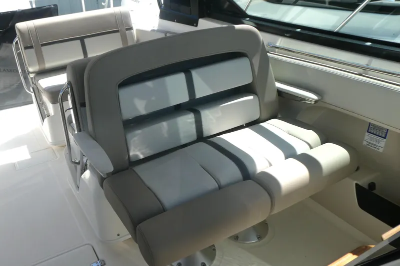 Slide: The Image of 2026 Boston Whaler 330 Vantage interior seating, featuring modern, comfortable design. - 10