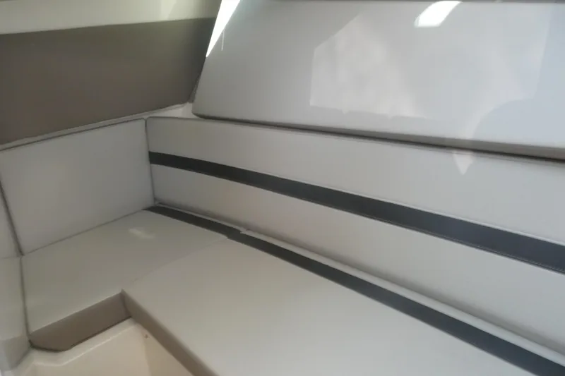 Slide: The Image of Interior seating of 2026 Boston Whaler 330 Vantage, featuring sleek, modern design. - 12