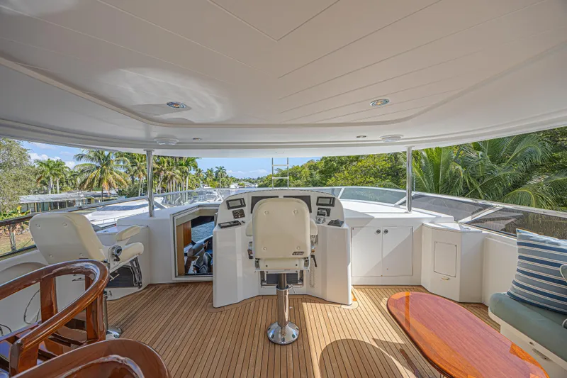 Slide: The Image of Luxurious 2011 Westport 112 yacht helm with tropical views and elegant seating. - 13