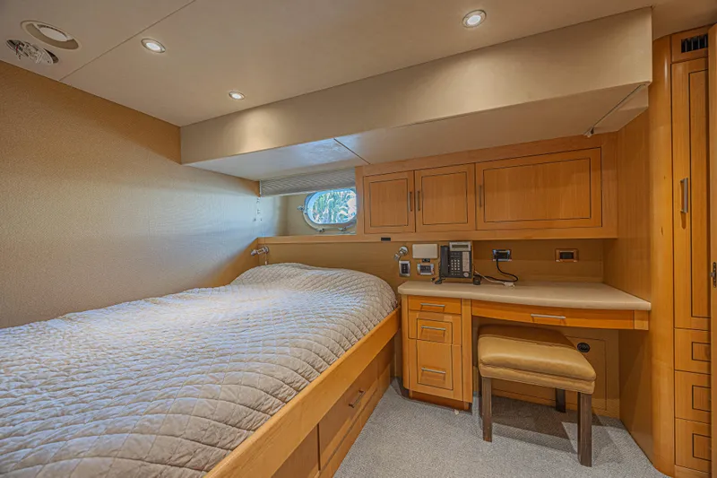 Slide: The Image of Luxurious cabin interior of 2011 Westport 112 yacht with bed and desk. - 57