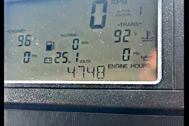 Slide: The Image of Dashboard display showing engine metrics for a 2011 Westport 112 yacht. - 67