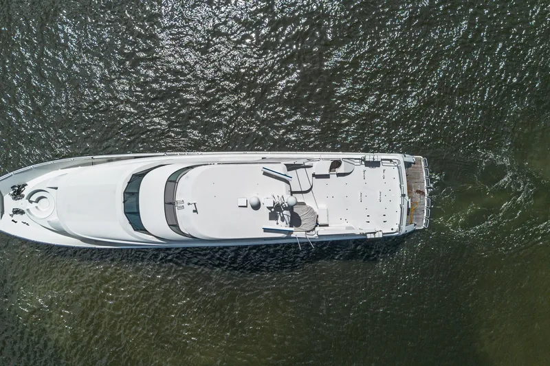 Slide: The Image of Aerial view of 2011 Westport 112 yacht cruising on water. - 80