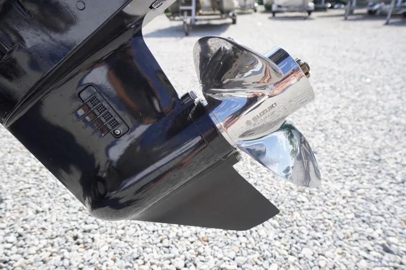 Slide: The Image of Close-up of a Suzuki boat propeller on a 2024 Carolina Skiff 182. - 11