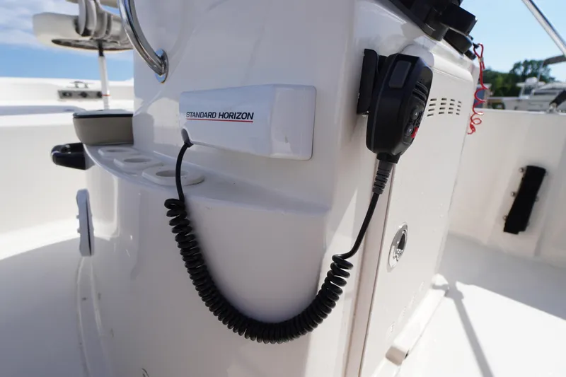 Slide: The Image of 2024 Carolina Skiff 182 boat console with Standard Horizon radio equipment. - 25