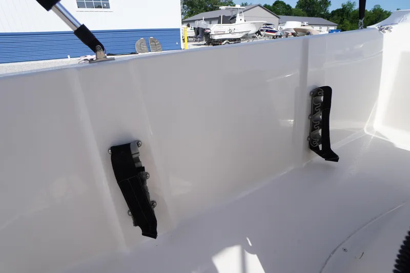 Slide: The Image of 2024 Carolina Skiff 182 boat interior detail with mounted accessories, showcasing sleek design. - 30