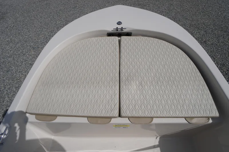 Slide: The Image of 2024 Carolina Skiff 182 boat bow with diamond-patterned cushioned seating. - 38