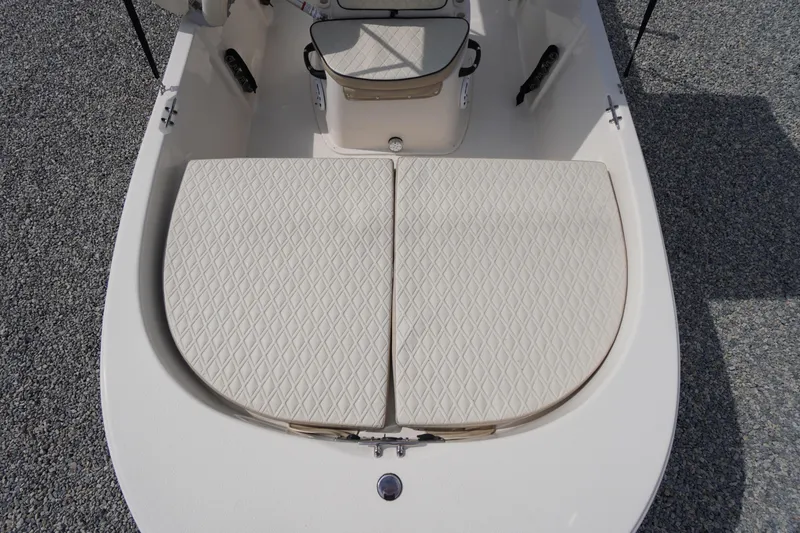 Slide: The Image of 2024 Carolina Skiff 182 boat interior with diamond-patterned seating. - 39