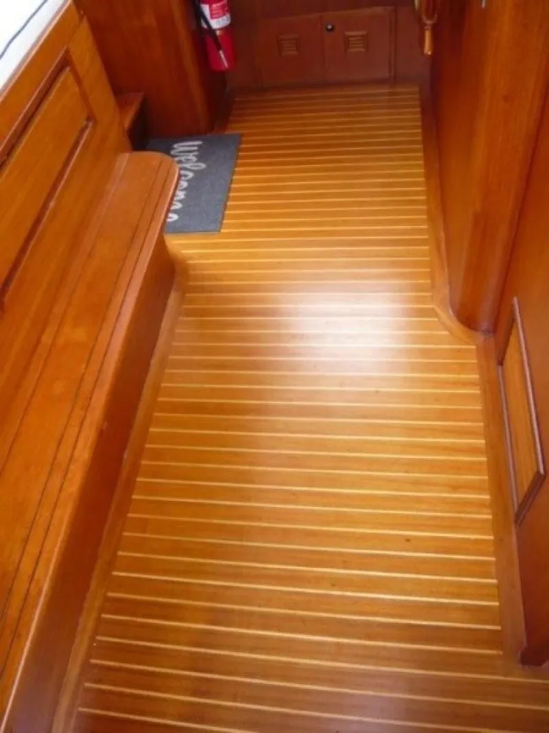 Slide: The Image of Teak interior flooring of a 1990 Cheoy Lee Sloop yacht. - 33