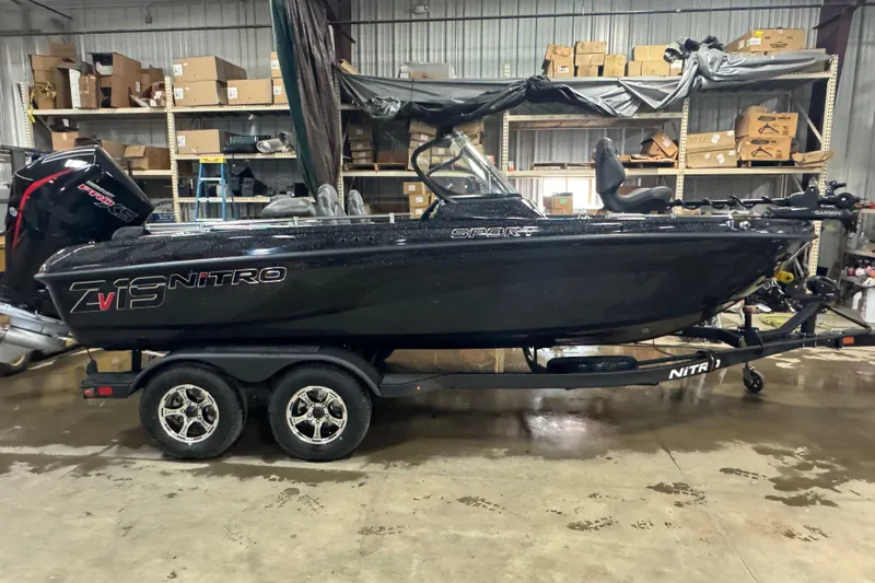 Slide: The Image of 2026 Nitro ZV19 Sport Pro boat in a warehouse setting. - 14
