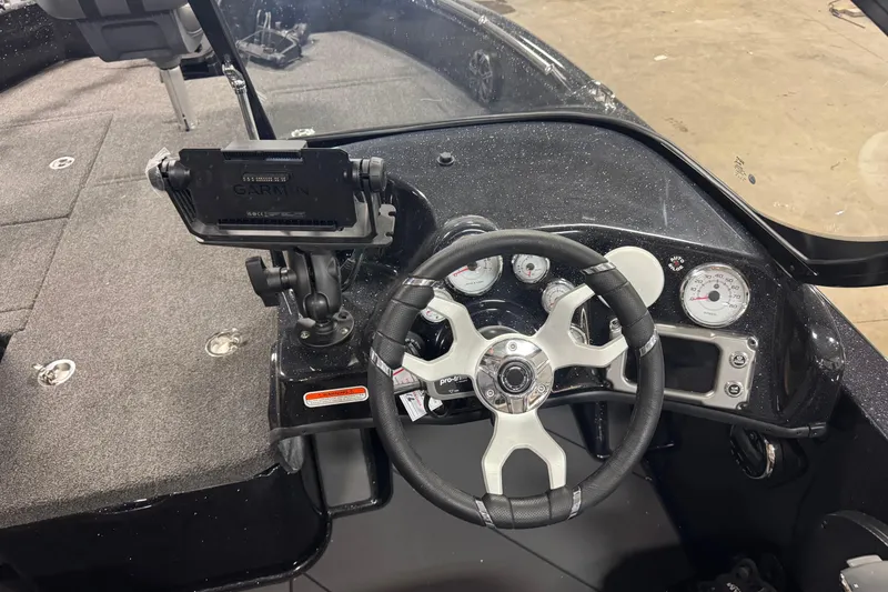 Slide: The Image of 2026 Nitro ZV19 Sport Pro dashboard with steering wheel and Garmin navigation system. - 18