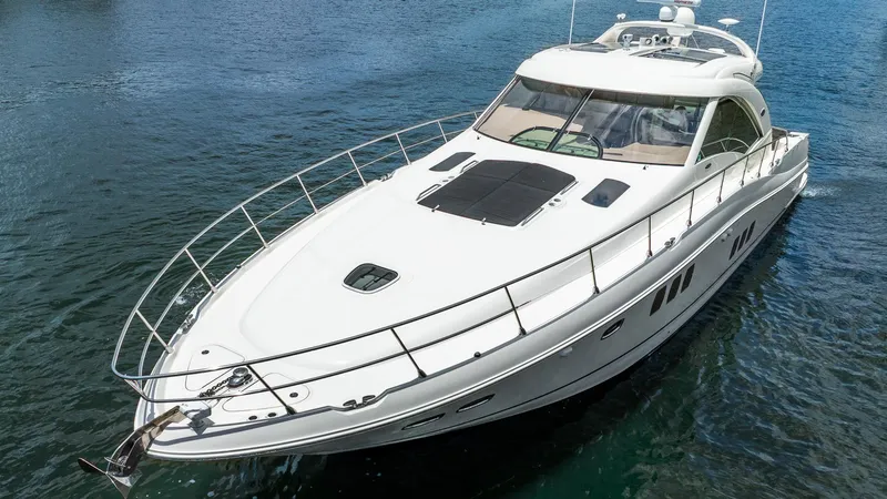 Slide: The Image of 2008 Sea Ray Sundancer yacht on calm water, showcasing sleek design and luxury features. - 2