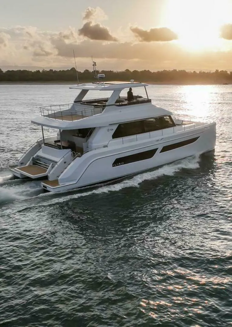 Slide: The Image of Luxury ILIAD 53F yacht cruising at sunset, 2026 model. - 21