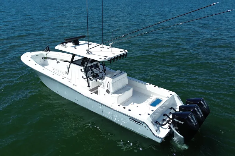 Slide: The Image of 2024 Invincible 36 Open Fisherman boat on calm ocean waters. - 10