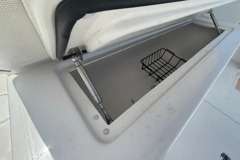 Slide: The Image of Open storage compartment on 2024 Invincible 36 Open Fisherman boat. - 22