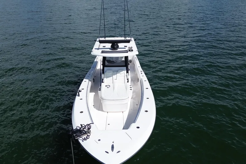 Slide: The Image of 2024 Invincible 36 Open Fisherman boat on calm water, aerial view. - 4