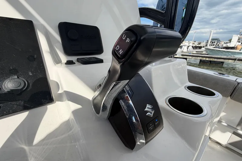 Slide: The Image of Control panel of 2022 Sea Pro 219 Deep V CC boat with throttle lever. - 18