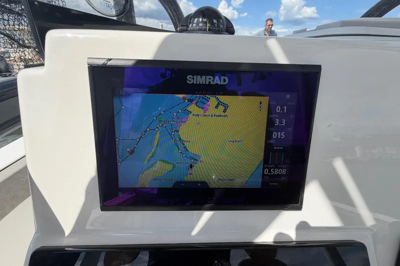 Slide: The Image of Simrad navigation display on 2022 Sea Pro 219 Deep V CC boat dashboard. - 20