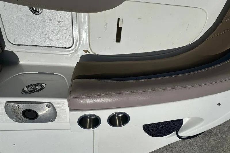 Slide: The Image of 2019 Hurricane Sundeck Sport 218 OB boat interior with seating and cup holders. - 11