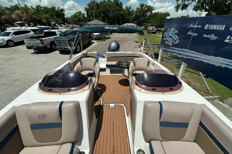 Slide: The Image of 2019 Hurricane Sundeck Sport 218 OB boat with spacious seating and sleek design. - 12