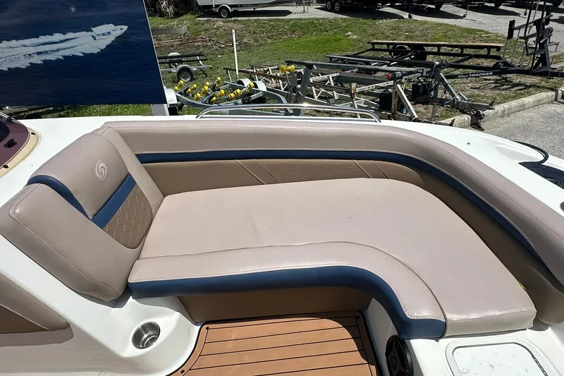 Slide: The Image of 2019 Hurricane Sundeck Sport 218 OB boat with beige and blue seating. - 7