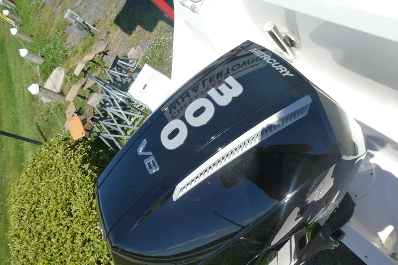 Slide: The Image of Mercury V8 engine on a 2026 Boston Whaler 240 Vantage boat, outdoor setting. - 3