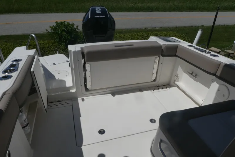 Slide: The Image of 2026 Boston Whaler 240 Vantage boat interior with seating and storage compartments. - 5