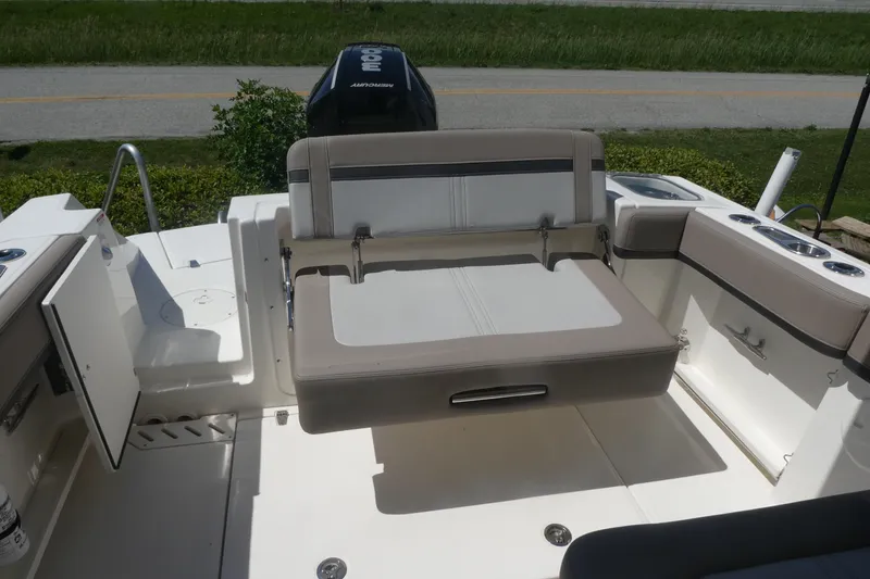 Slide: The Image of 2026 Boston Whaler 240 Vantage boat interior with seating and storage compartments. - 6