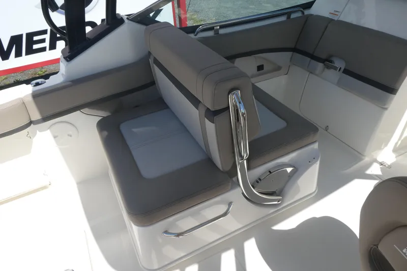 Slide: The Image of Interior seating of 2026 Boston Whaler 240 Vantage boat, featuring sleek design and comfortable upholstery. - 7