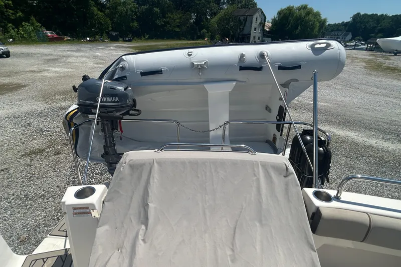 Slide: The Image of 2022 Cutwater C-30 CB boat with Yamaha outboard motor on a gravel lot. - 3