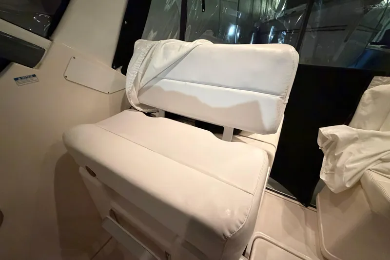 Slide: The Image of White seating on a 2004 Tiara Yachts 3200 Open boat interior. - 10