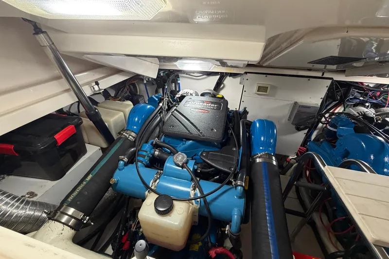 Slide: The Image of Engine room of a 2004 Tiara Yachts 3200 Open, featuring a Crusader engine. - 14