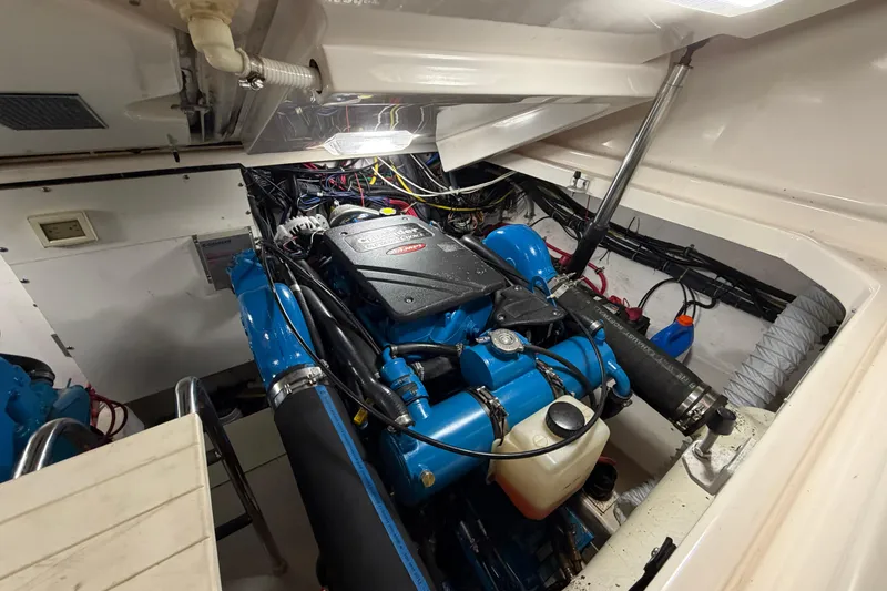 Slide: The Image of Engine room of a 2004 Tiara Yachts 3200 Open, showcasing detailed mechanical components. - 15
