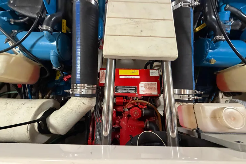 Slide: The Image of Engine compartment of a 2004 Tiara Yachts 3200 Open, showcasing mechanical components. - 16