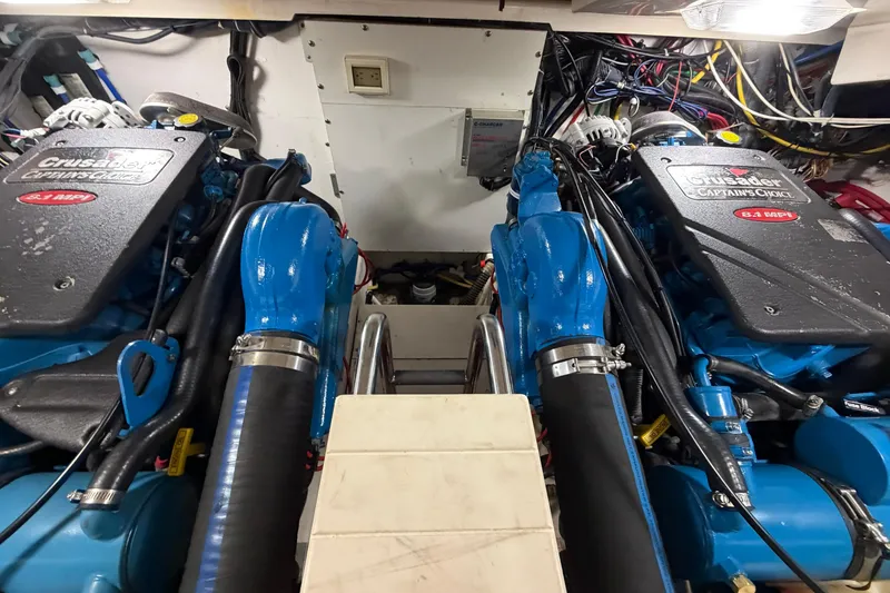 Slide: The Image of Engine room of a 2004 Tiara Yachts 3200 Open, featuring Crusader Captain's Choice engines. - 16