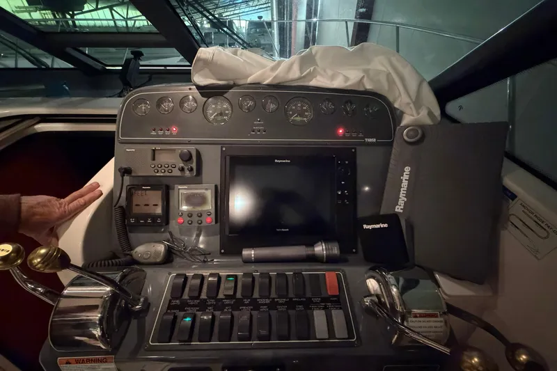 Slide: The Image of Control panel of a 2004 Tiara Yachts 3200 Open with navigation equipment. - 7